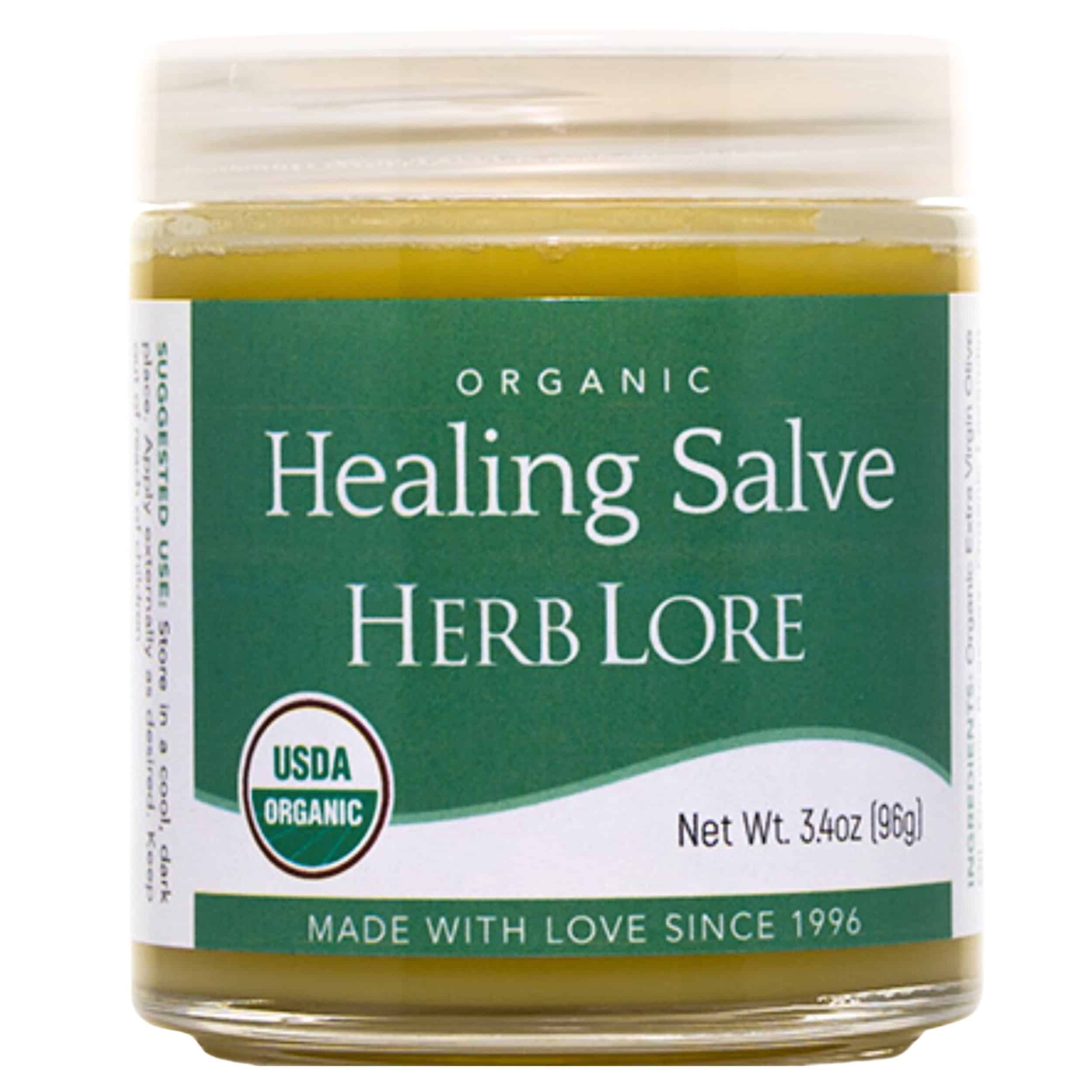 Larger jar of Herb Lore Organic Healing Salve (3.4 oz) with green label and white lid. Marked USDA Organic and made since 1996.