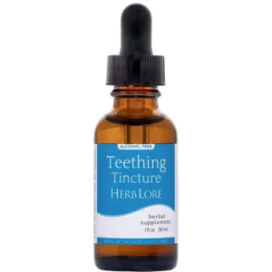 Amber glass bottle of 1 fl oz Herb Lore Teething Tincture with a dropper cap and blue and white label indicating alcohol-free formula