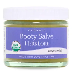 Herb Lore Organic Booty Salve jar with purple label and white lid, 1.8 oz size