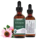 Front and back view of a 2 oz bottle of Herb Lore Organic Echinacea Tincture with fresh echinacea flowers beside it