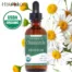 Herb Lore Chamomile Tincture bottle with blooming chamomile flowers in the background and USDA Organic seal