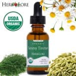 Herb Lore Organic Tummy Tincture bottle with fennel seeds, dill, and chamomile flowers
