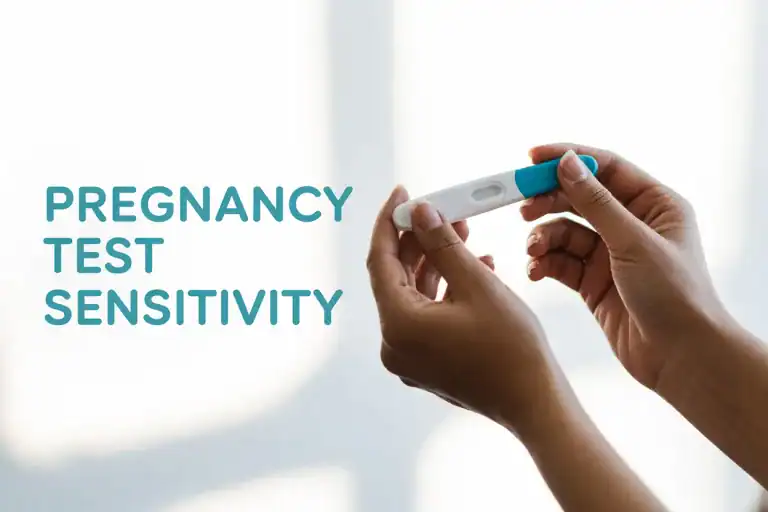 Pregnancy Test Sensitivity Feature - Woman holding a pregnancy test with no text results on it.